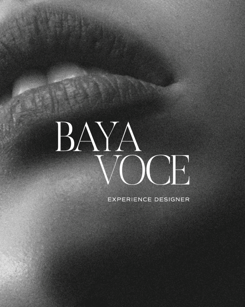 Black-and-white close-up of lips overlaid with the Baya Voce logo, evoking intimacy and the brand’s seductive aesthetic.